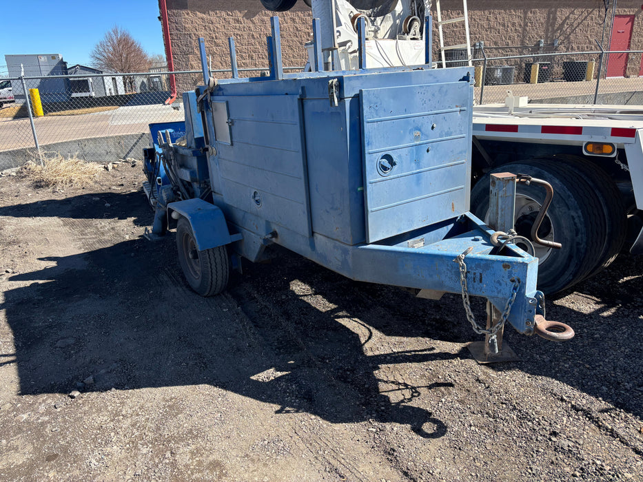 "Used Reed M20 pump with mixing hopper attachment, 3,605 hours."